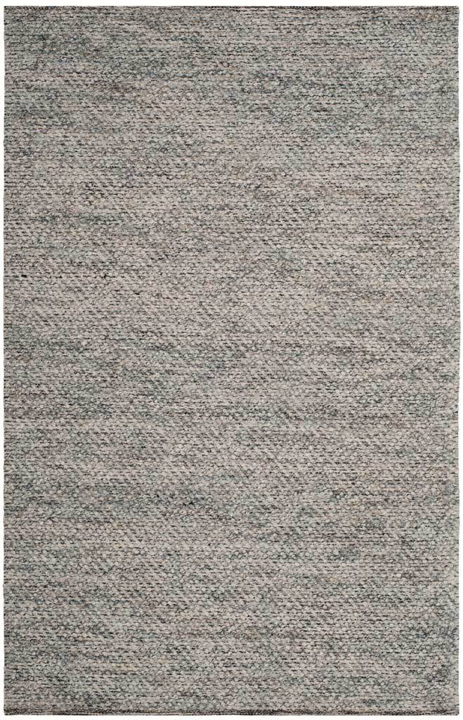 A 4' x 6' camel and gray rug adds warm, neutral color and finely woven texture.