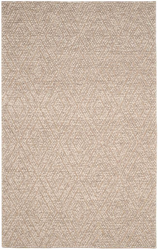 Beige rug with repeating diamond motifs and an inviting nubby wool-cotton texture