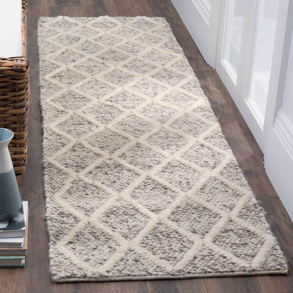 Ivory diamond lines add cozy texture to a stone-gray hallway runner