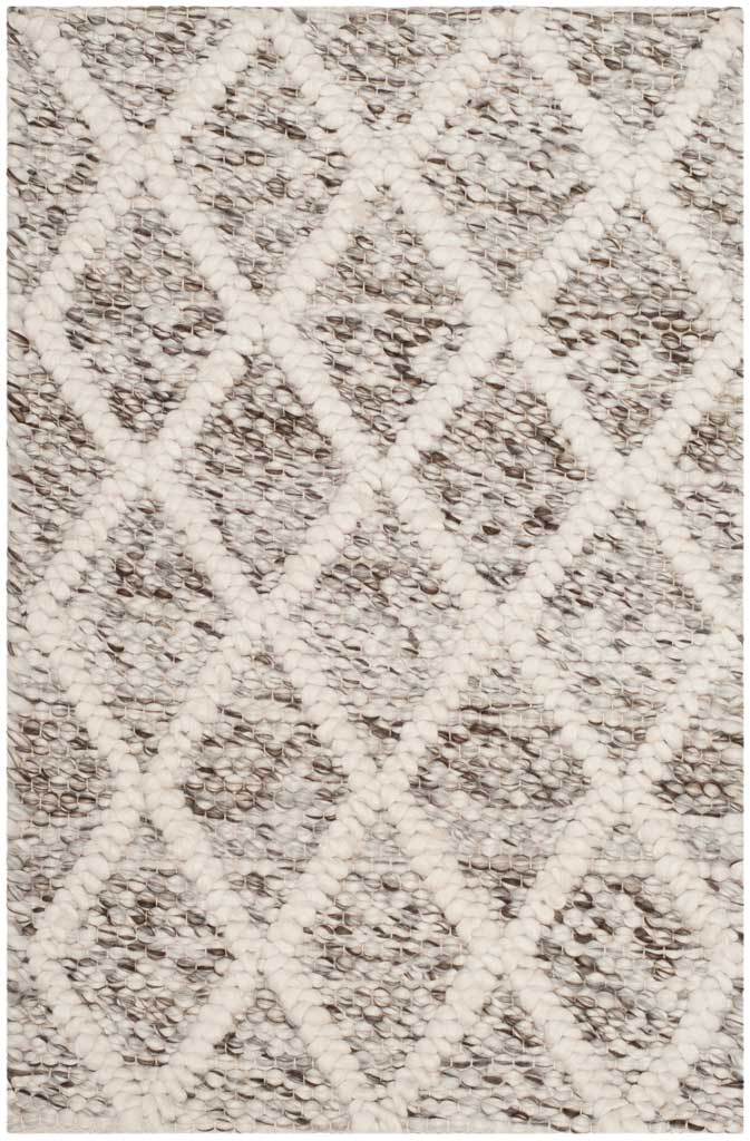 Chunky ivory latticework brings inviting texture to this compact stone and ivory accent rug.