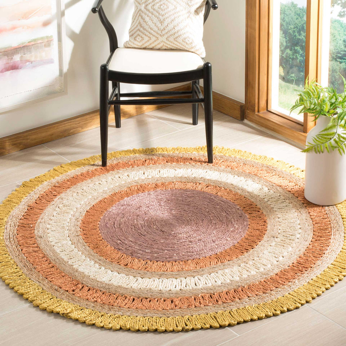 Sun-warmed gold and ivory rings frame a mauve center for a cheerful woven jute accent.