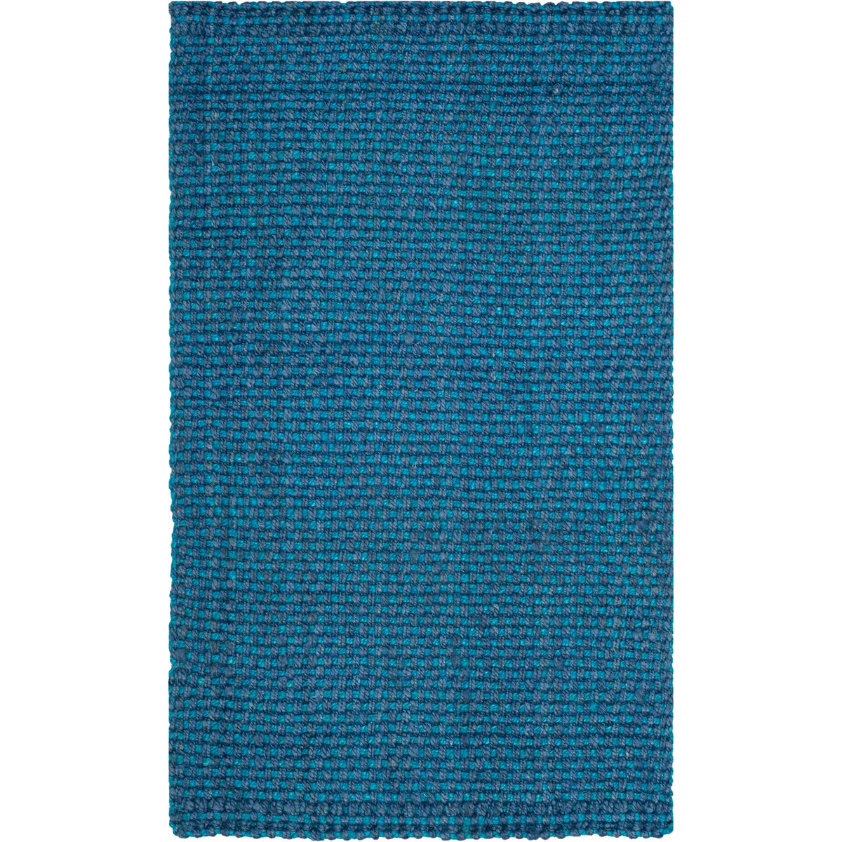 Compact blue jute rug offers bold color and a thick, tactile woven surface.