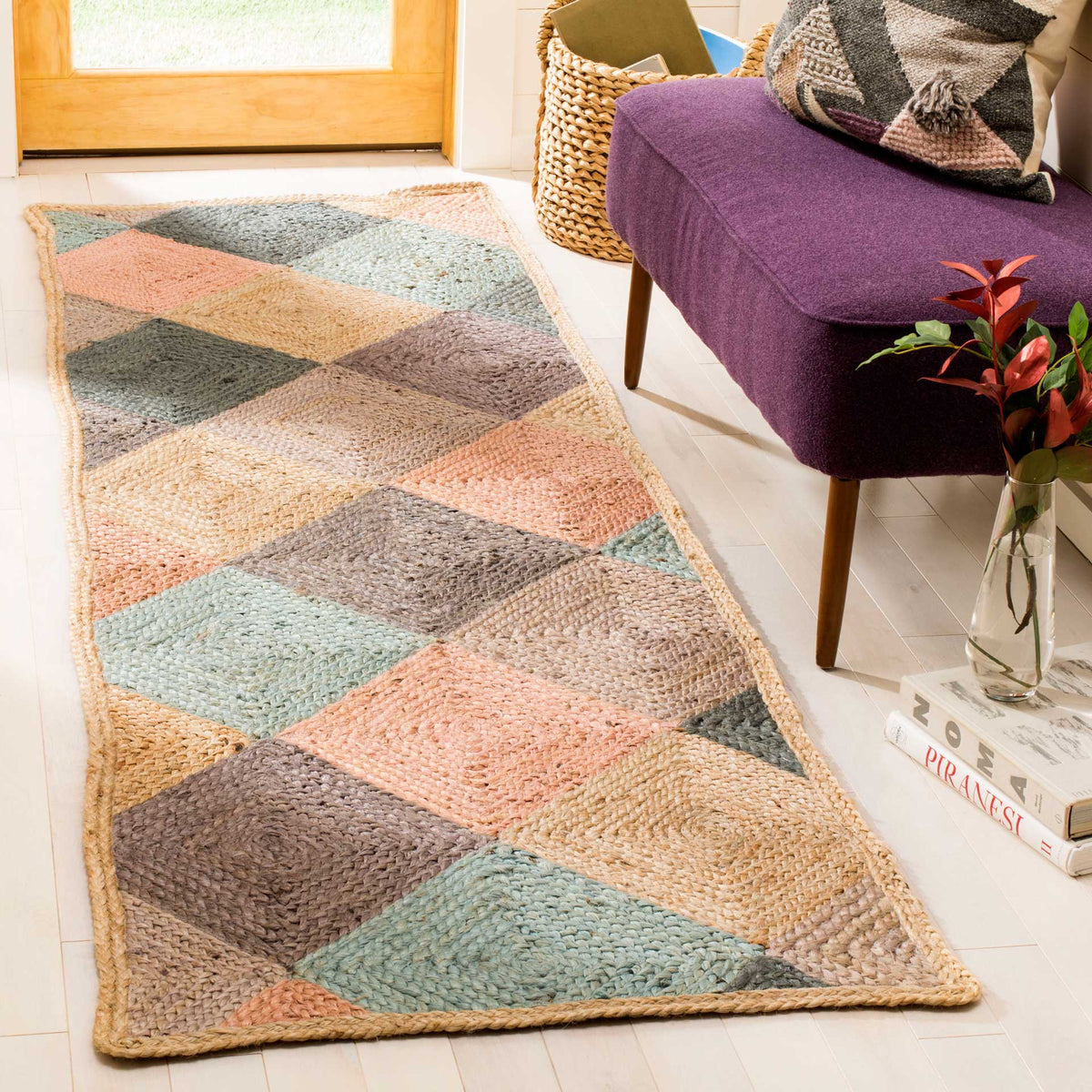 Oversized pastel geometric blocks bring soft color and playful structure to a woven jute runner.