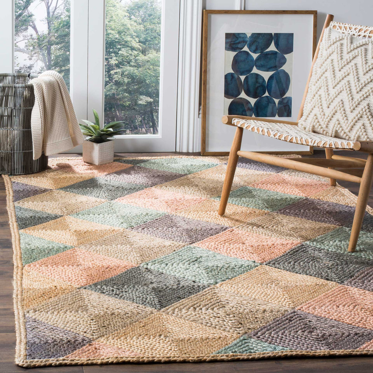 Softly colored diamond blocks add a relaxed, playful foundation beneath a wood-framed chair.