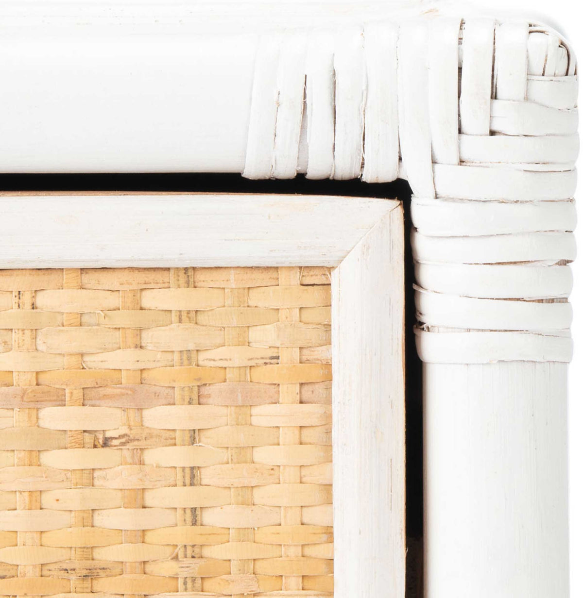 White wrapped corner joints add layered texture beside the natural cane panel