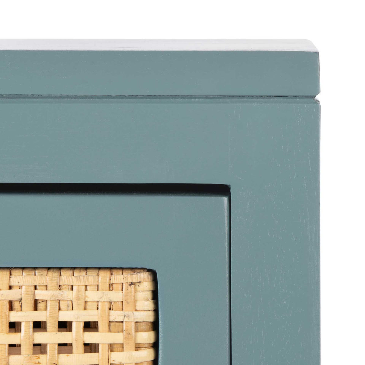 Blue-gray wood trim creates a soft contrast with the natural cane weave