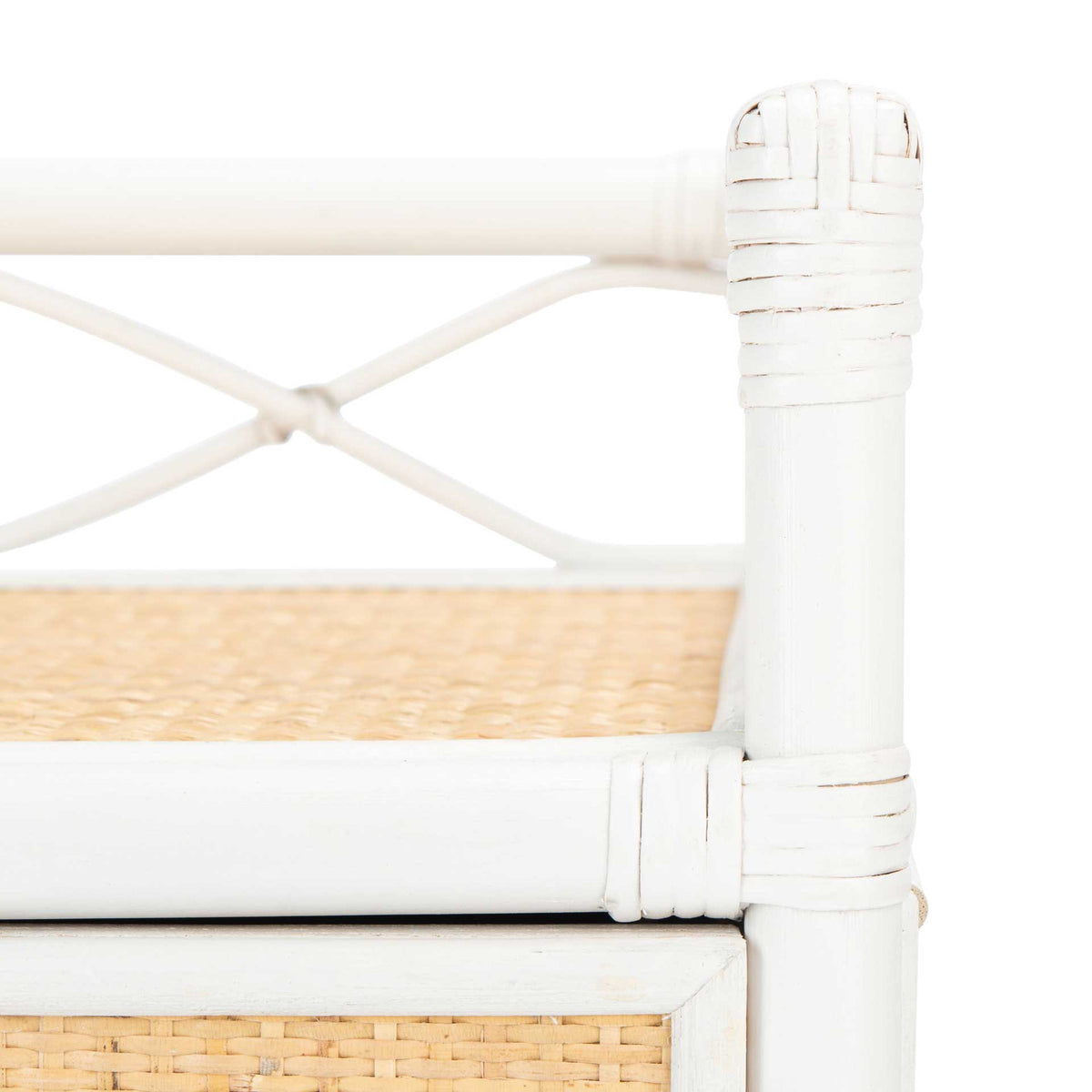 White-wrapped corner joints meet a natural cane top and airy crisscross railing