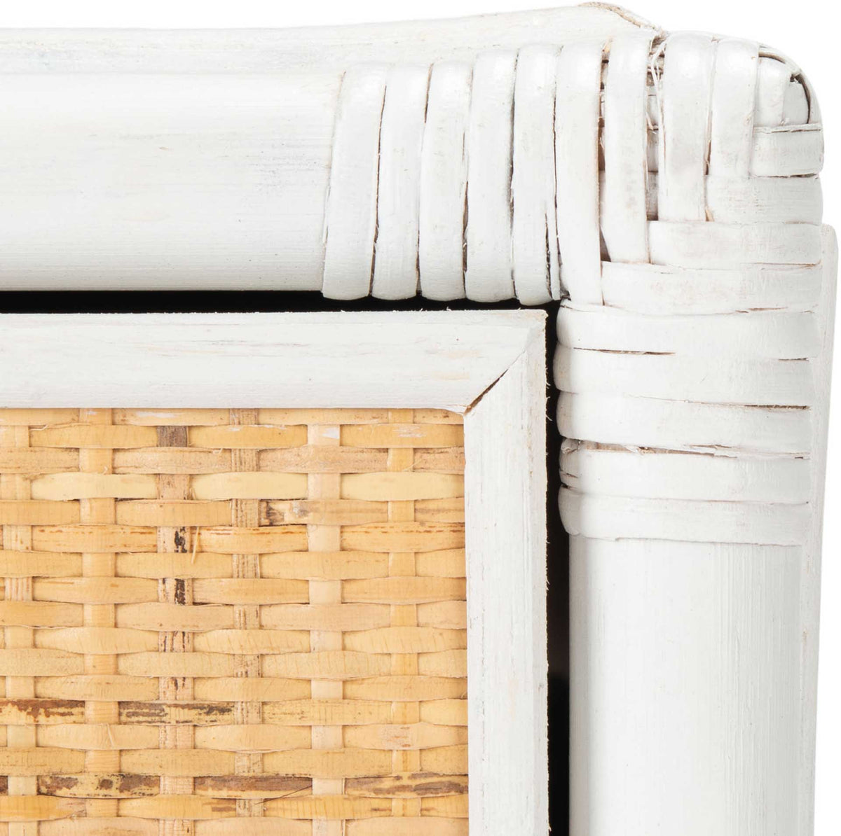 White wrapped corner trim showcases handwoven cane and a subtly weathered finish