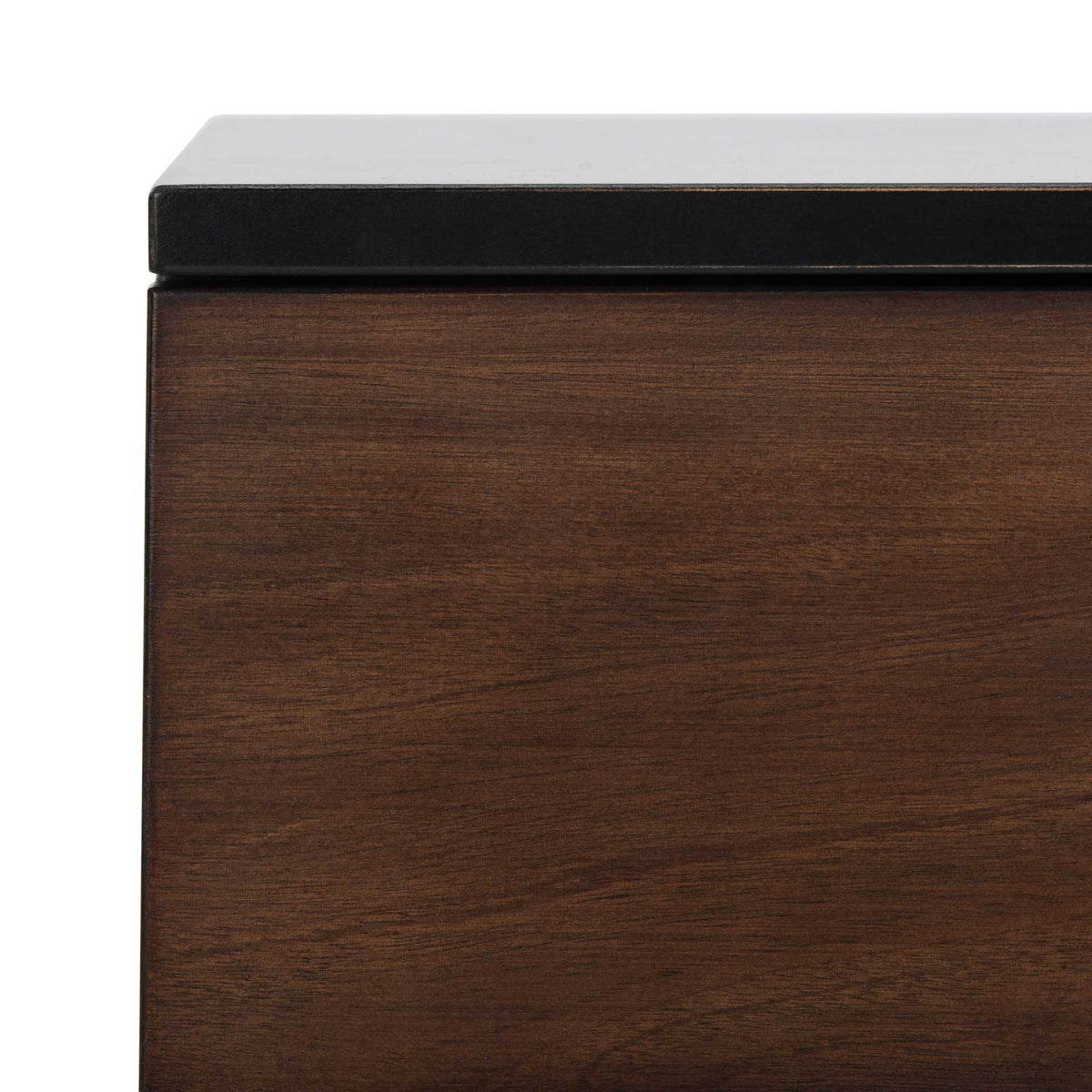 The rich walnut-finished drawer front sits just below a smooth black tabletop.