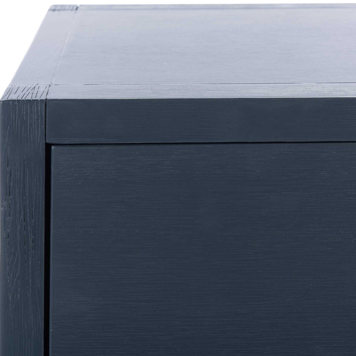 Fine wood-grain texture brings depth to the navy finish along the top and drawer frame.