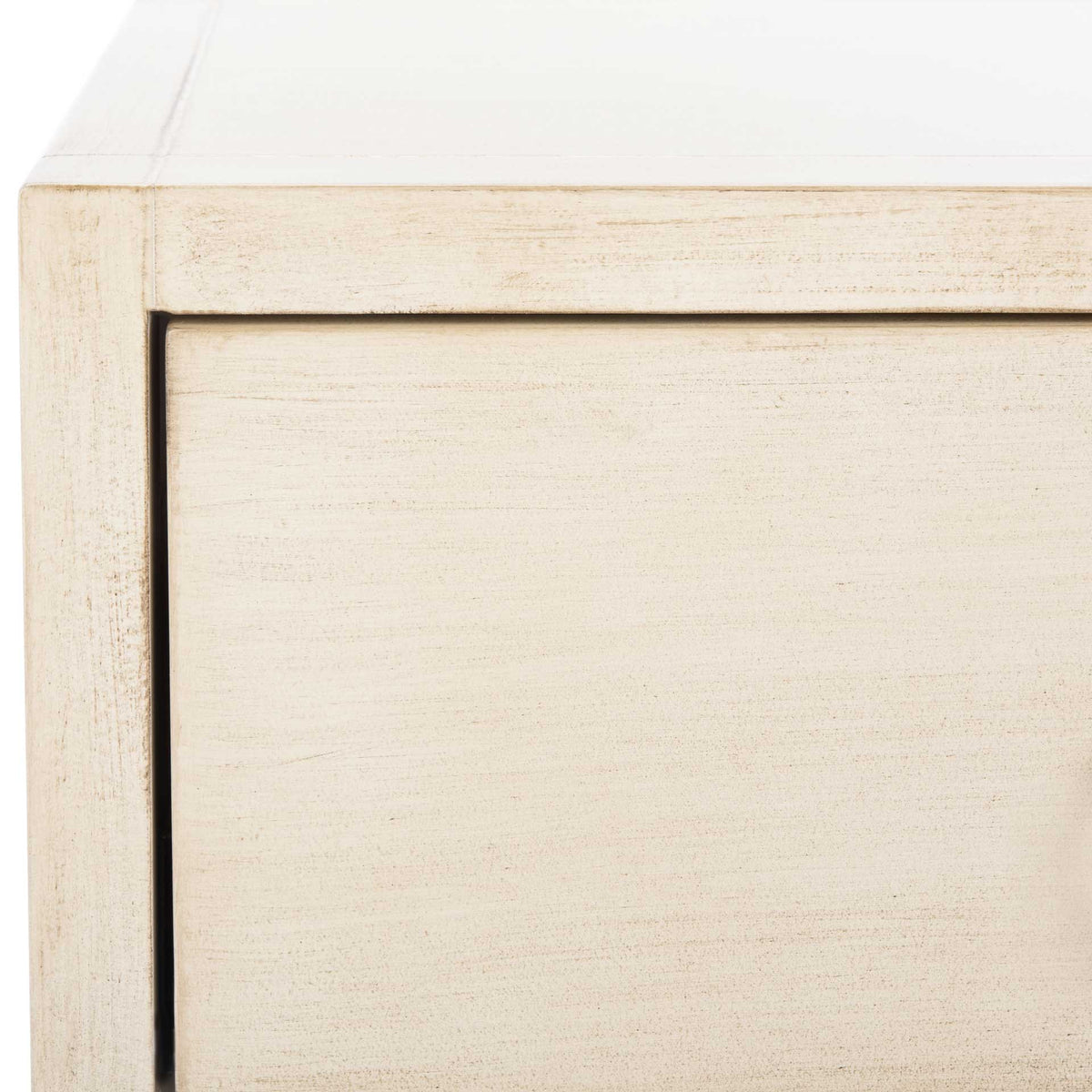 Subtle distressed texture brings depth to the antique white finish around the drawer and tabletop.