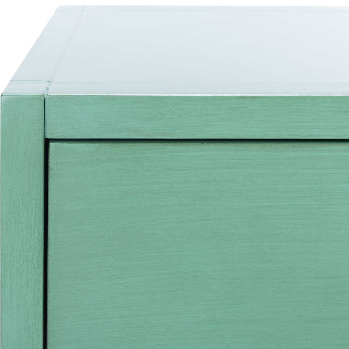 The turquoise finish highlights fine grain and crisp edges around the drawer and tabletop.