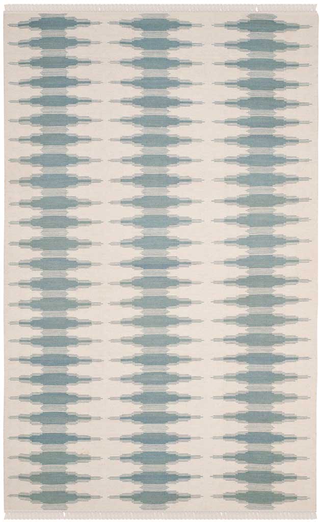 Painterly blue marks repeat in three columns across an ivory handwoven wool rug.