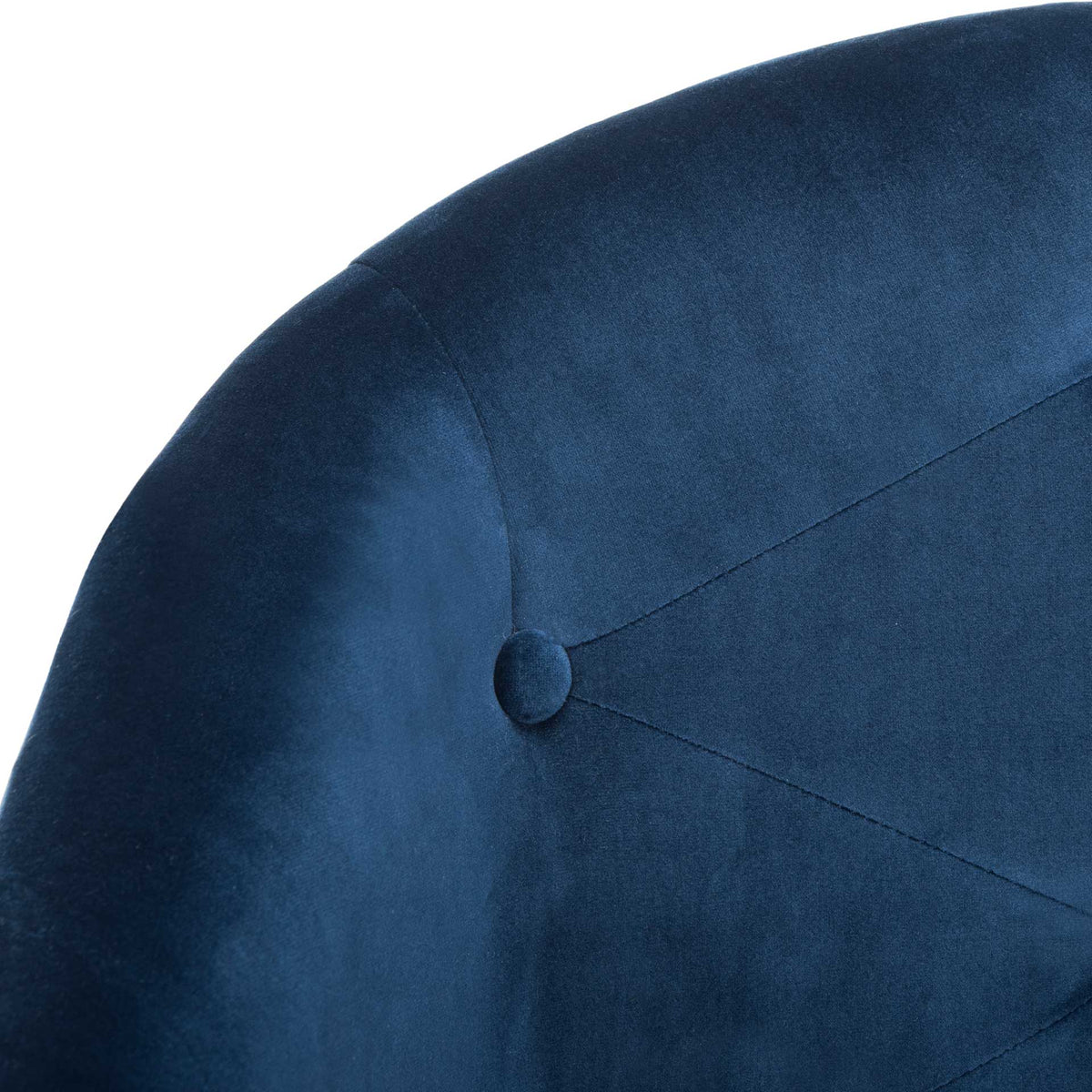 Plush navy velvet and a fabric-covered tufting button create a soft, tailored finish