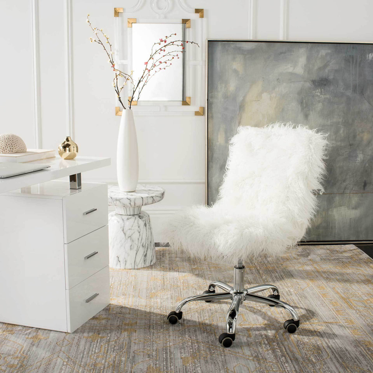 A white faux sheepskin swivel chair pairs a cozy seat with a chrome rolling base for the home office.