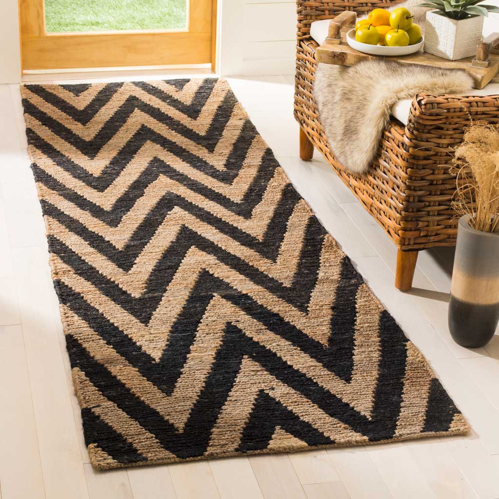 Black and natural chevrons bring graphic warmth to a textured jute runner