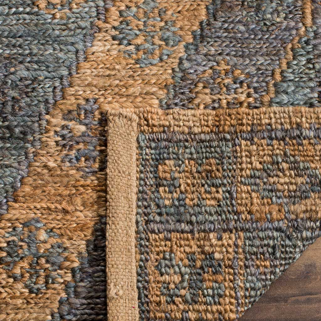 Folded rug edge reveals a woven backing and sturdy jute binding
