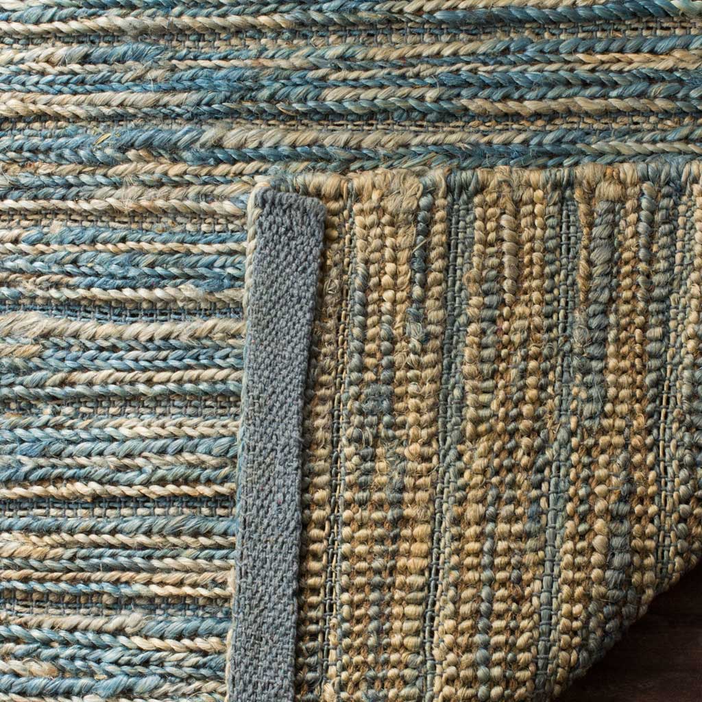 A folded edge reveals the rug's densely woven underside and durable bound finish.