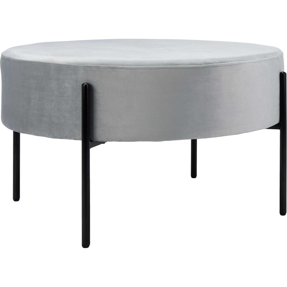 Soft gray velvet wraps a generous round cushion raised on slim matte black metal legs || OTT6203C || front_angle_studio