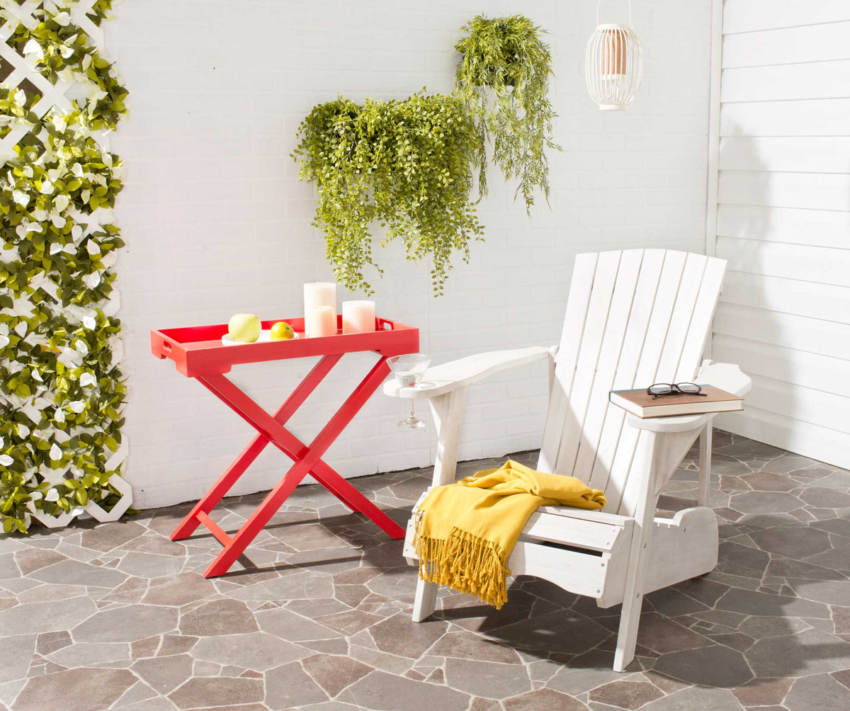 A bright white Adirondack chair offers an inviting spot to unwind on the patio