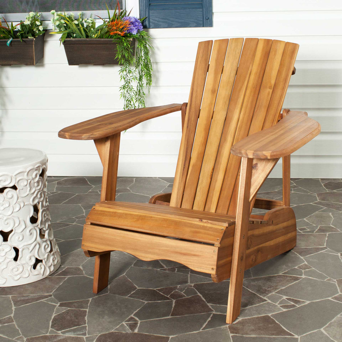 Warm natural acacia and a gently reclined back invite lingering on the patio