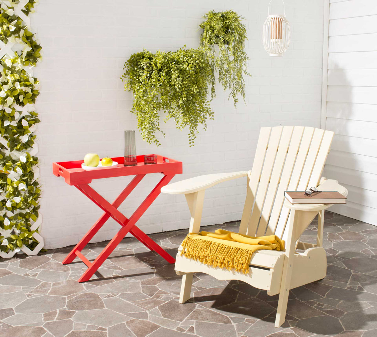 Off-white Adirondack chair offers a relaxed patio retreat with broad arms and a sloping seat