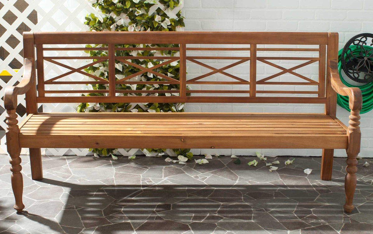Natural wood lattice-back bench brings warm, relaxed seating to a tiled patio
