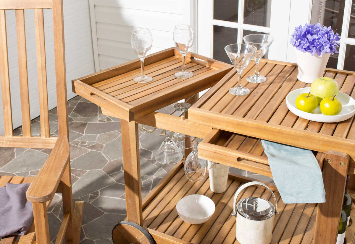 A slatted wood serving tray holds wine glasses beside a roomy cart top for drinks and snacks.