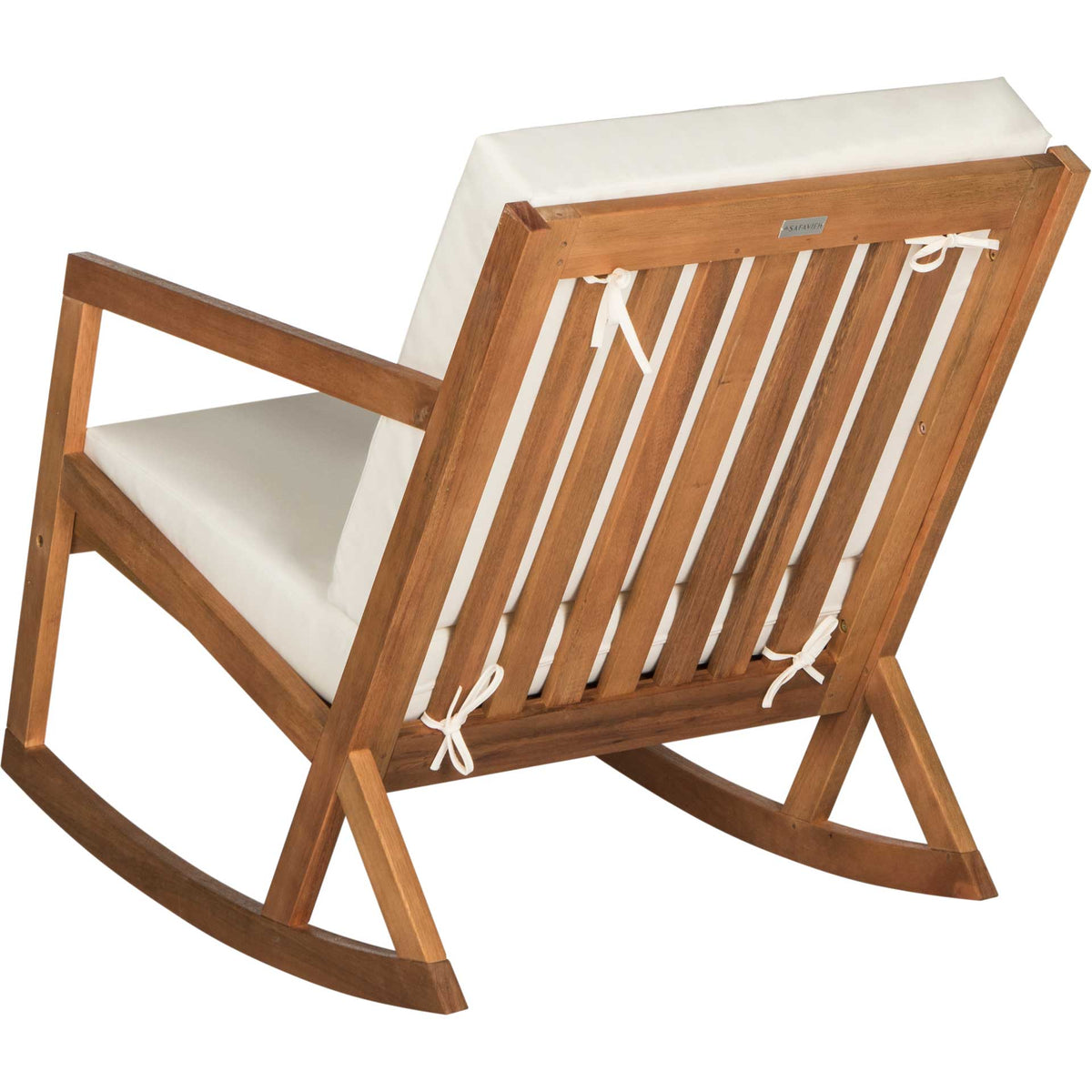 Open natural wood slats and cushion ties lend airy detail to the chair's angled backrest.