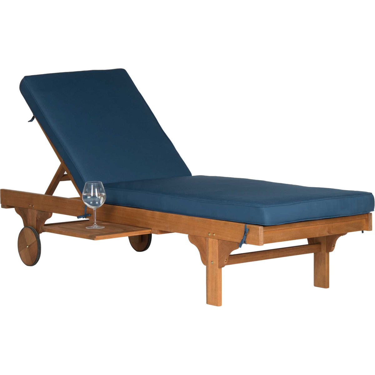 A sliding wood side tray holds a drink beside the chaise lounge's thick navy cushions.