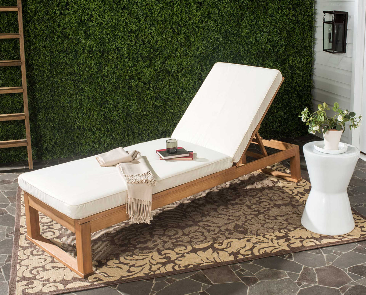 Beige cushioning and a natural wood frame bring relaxed comfort to the patio.