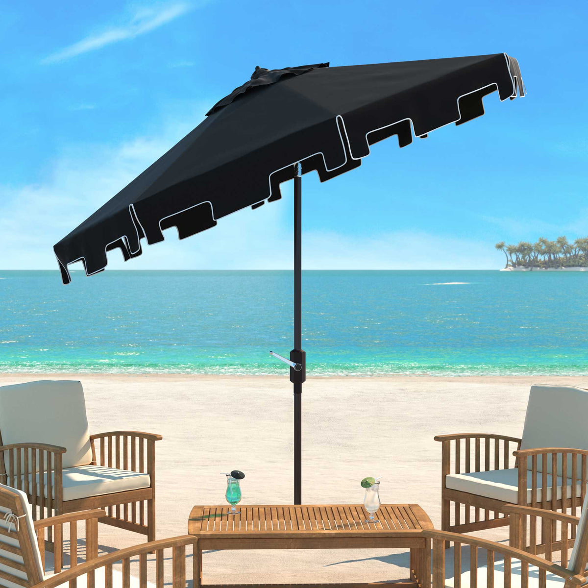 Black umbrella tilts above patio seating, with crisp white trim along its valance
