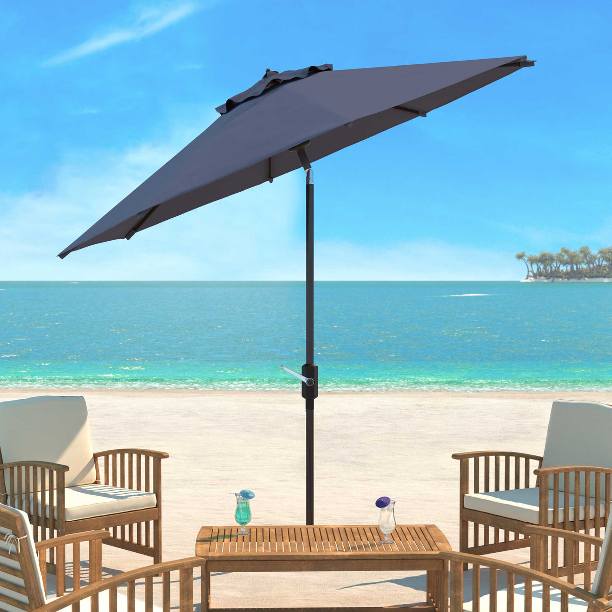 A gray tilting canopy shades a wooden patio table and coastal seating