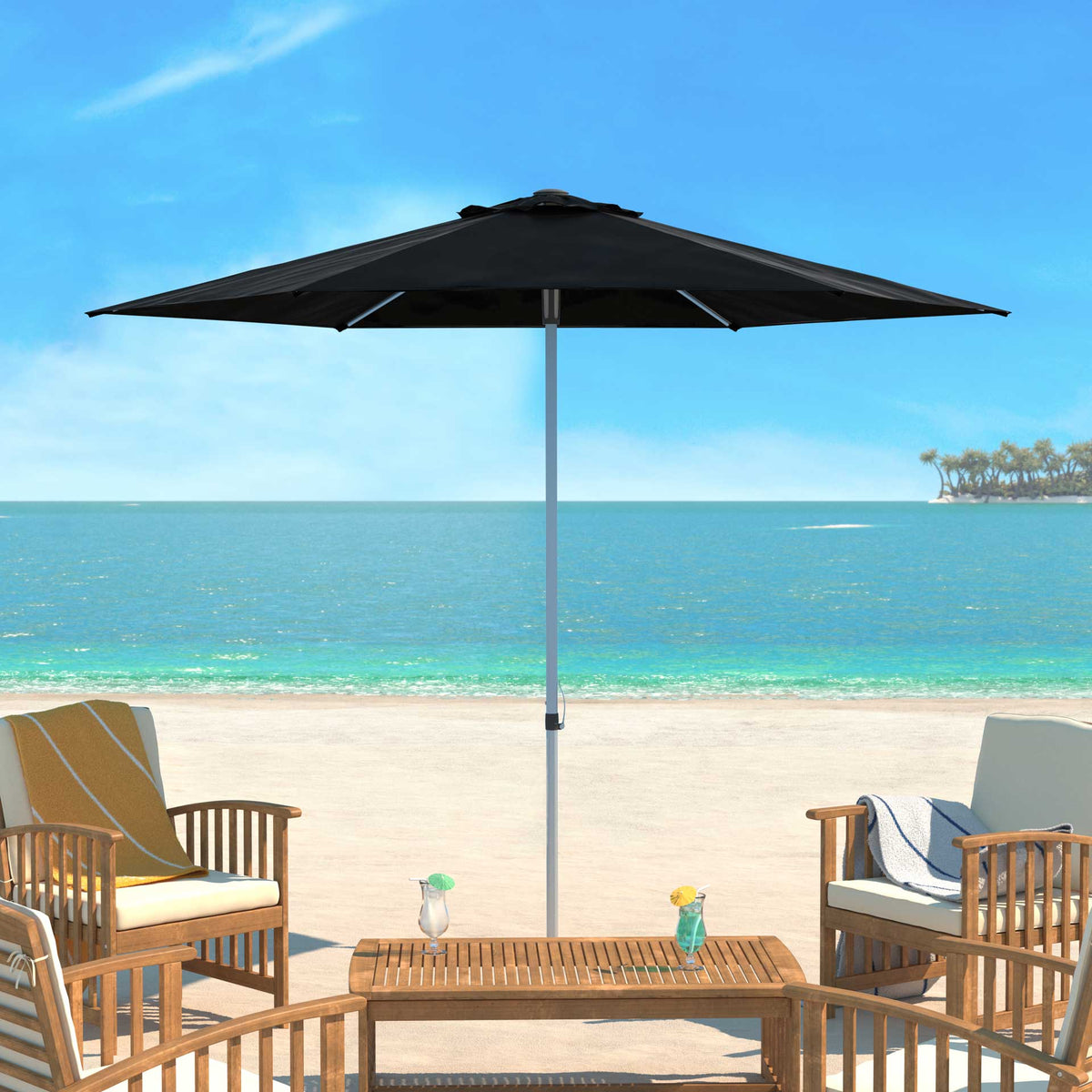 A black canopy shades a relaxed seating area beside the water.