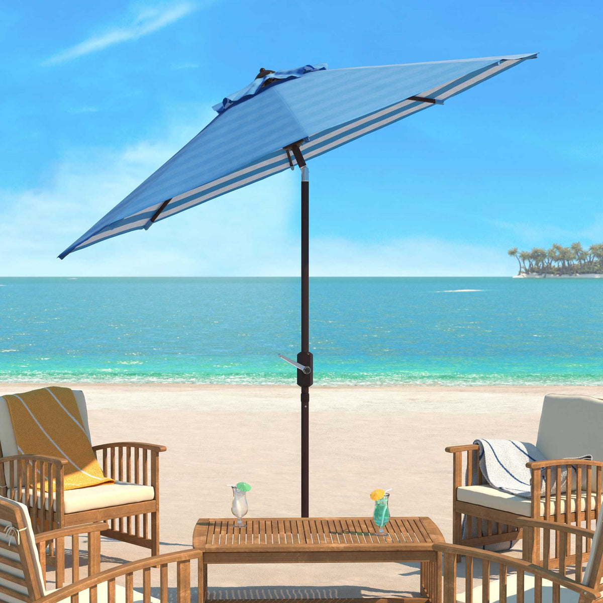 A light blue tilting umbrella shades an inviting coastal lounge beside the water.