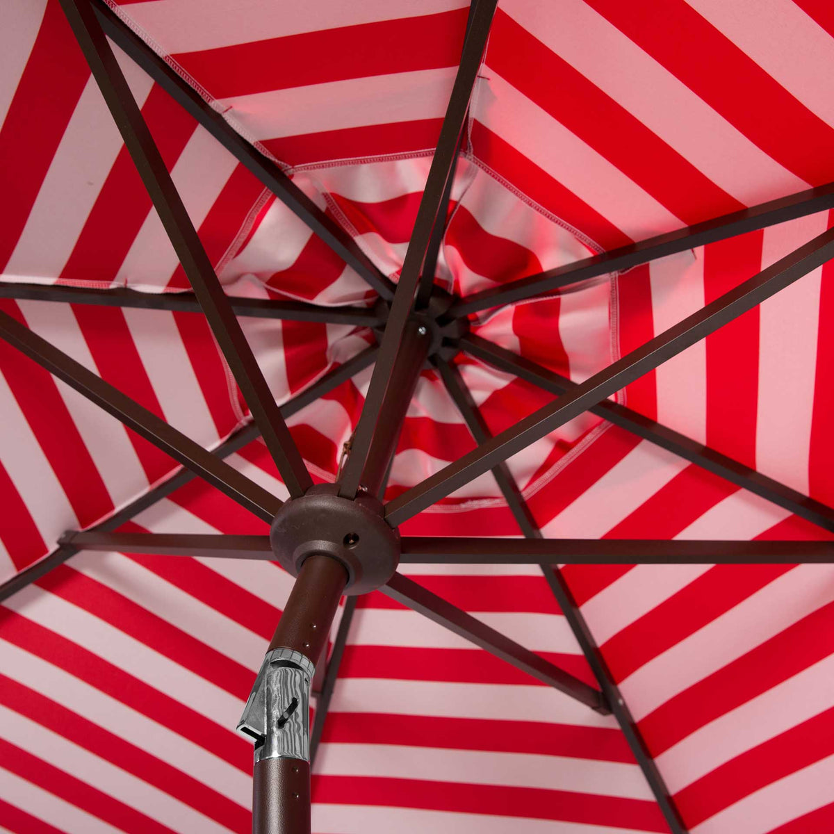 Red-and-white stripes accent the underside, where sturdy ribs support the canopy.