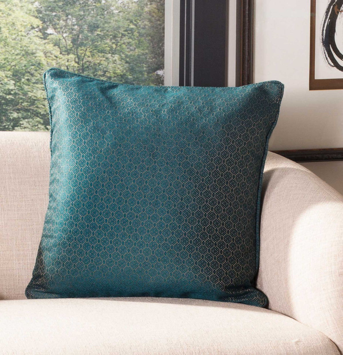 Plush square pillow pairs deep teal color with a subtle beige pattern for an inviting accent