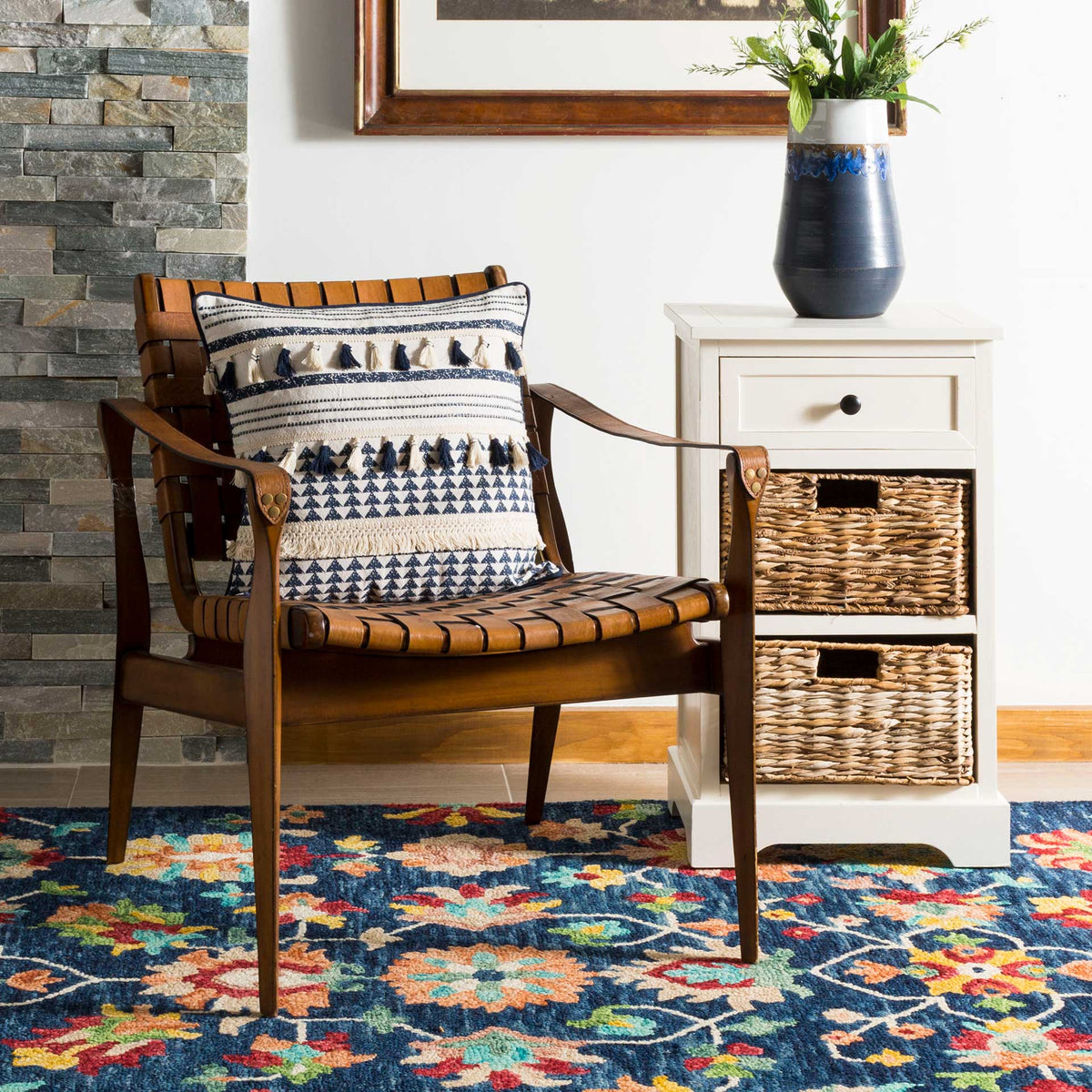 Navy and cream patterned pillow adds texture and color to a wooden accent chair