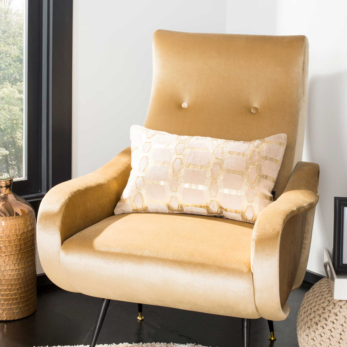 Gold geometric embroidery brightens this beige lumbar pillow with a cozy, elegant touch