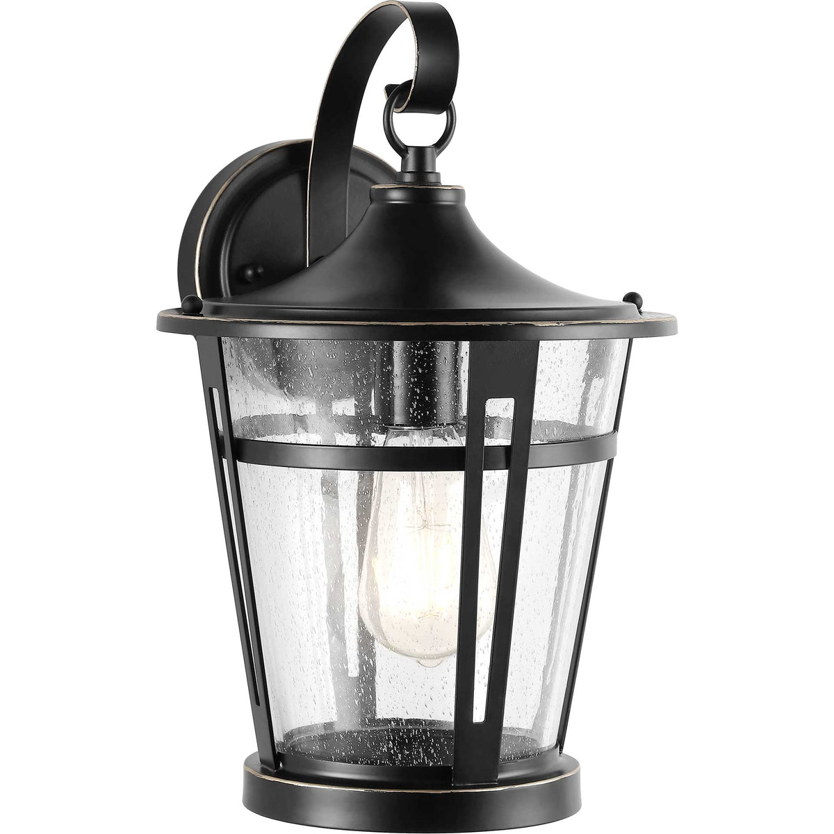 A glowing bulb illuminates the textured glass of a tapered lantern framed in dark metal.