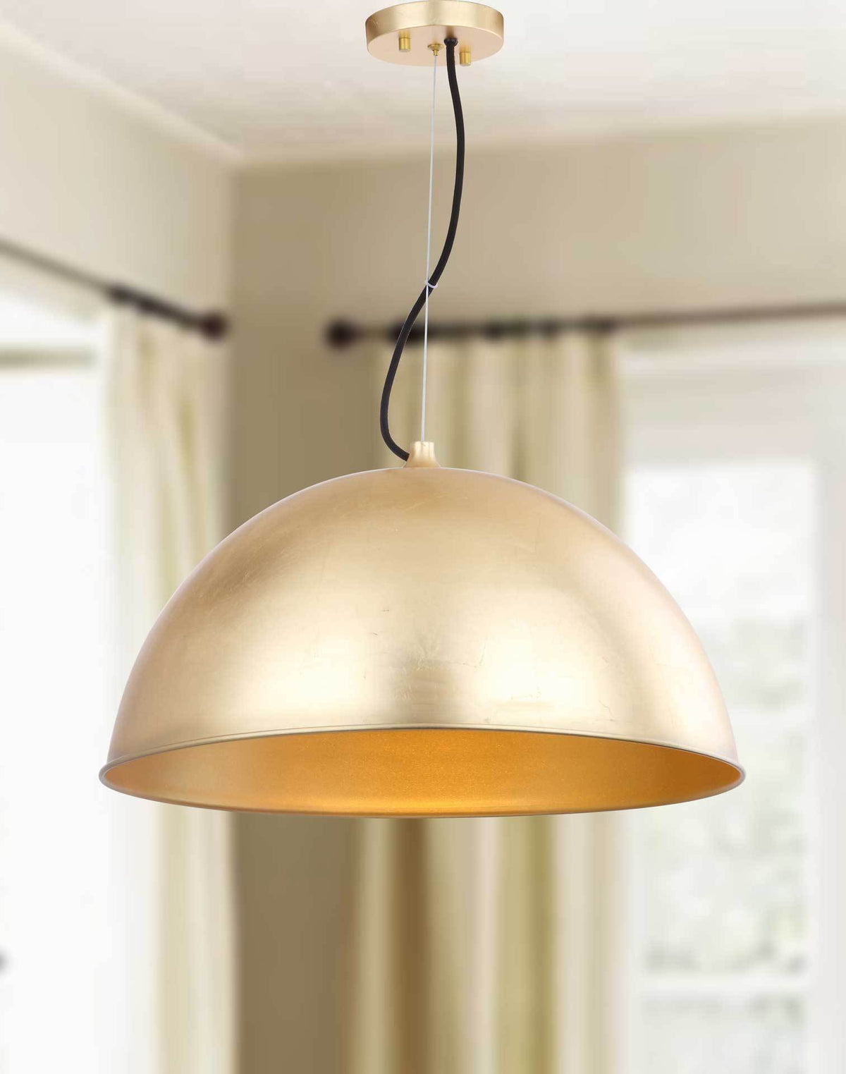 Warm light from the gold dome brings an inviting glow to a bright room