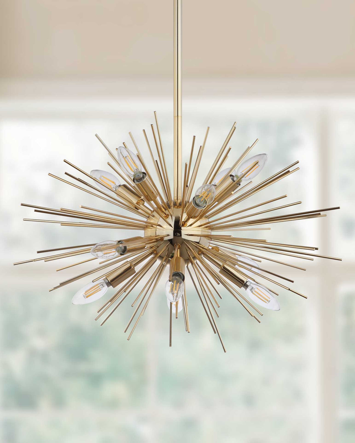 Slender gold rays surround clear bulbs to create a striking starburst