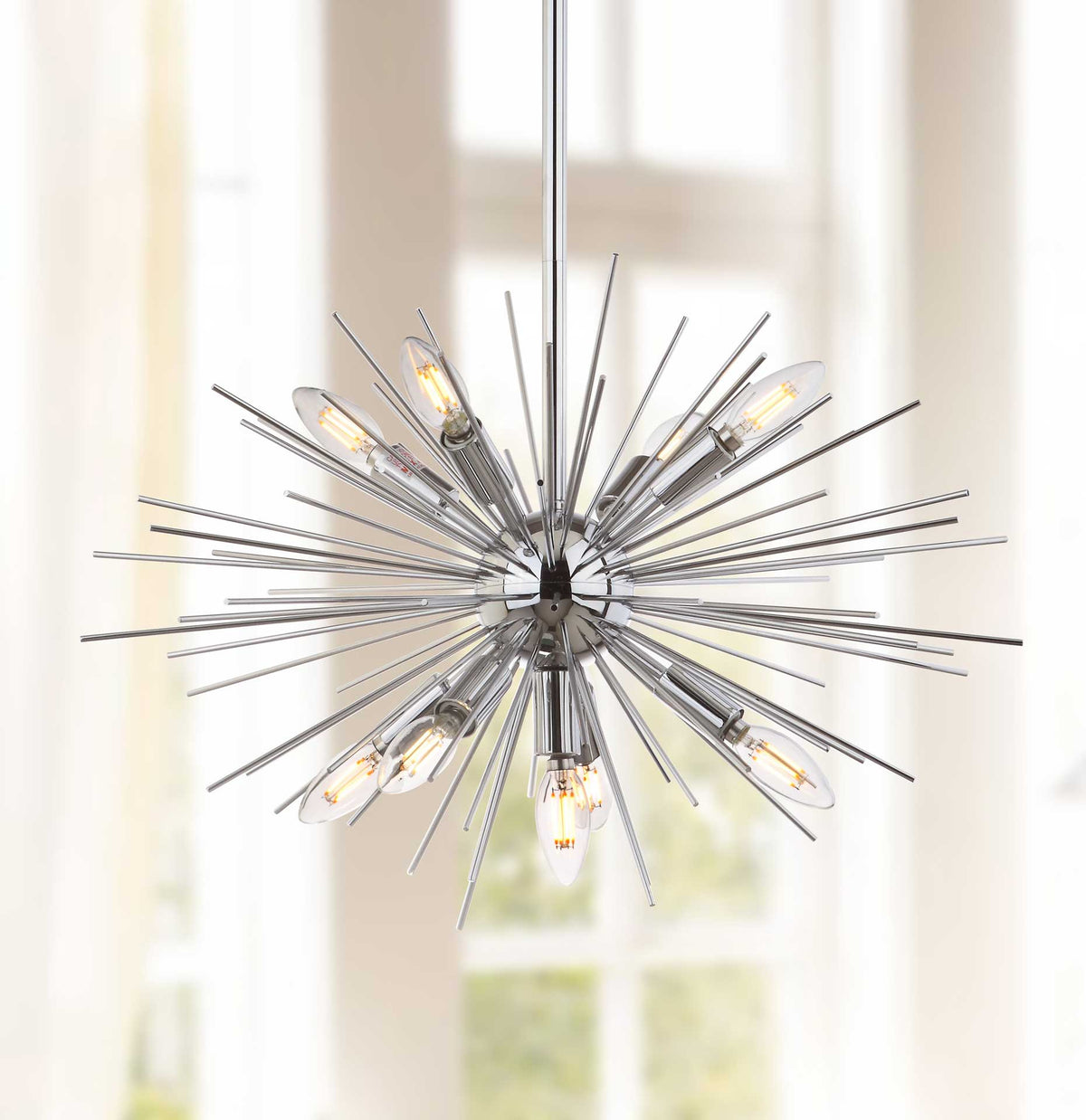 Warmly lit bulbs shine among the pendant's radiating metal rods.