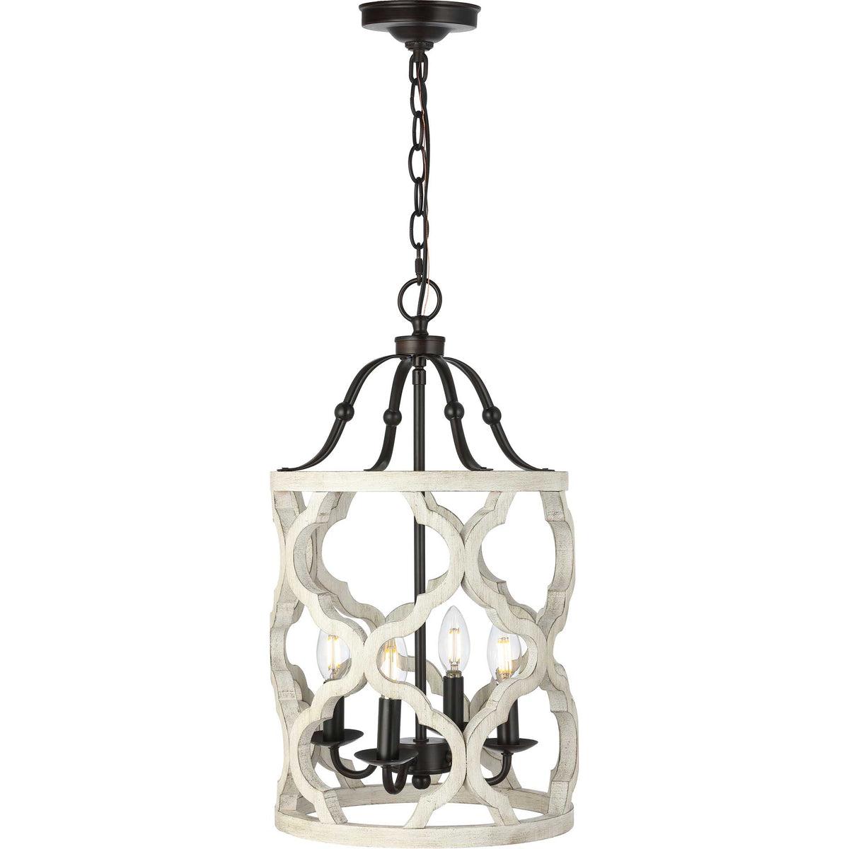 Four glowing candle lights shine through an airy white wood cage with interlocking curves