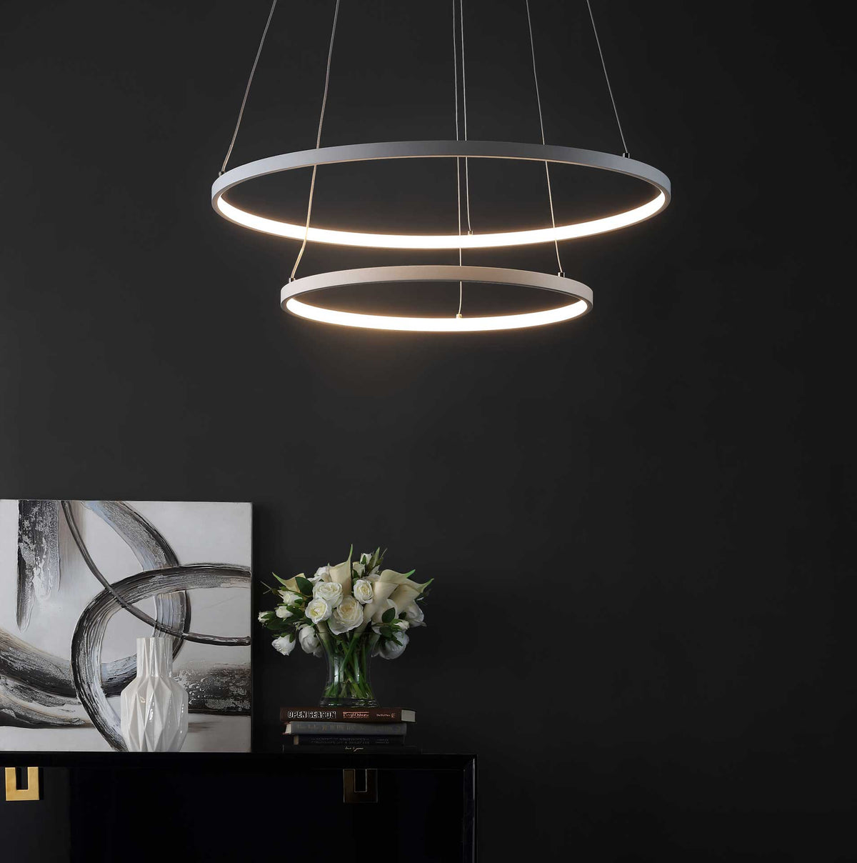 Warm light radiates from two suspended LED rings for an inviting, modern glow