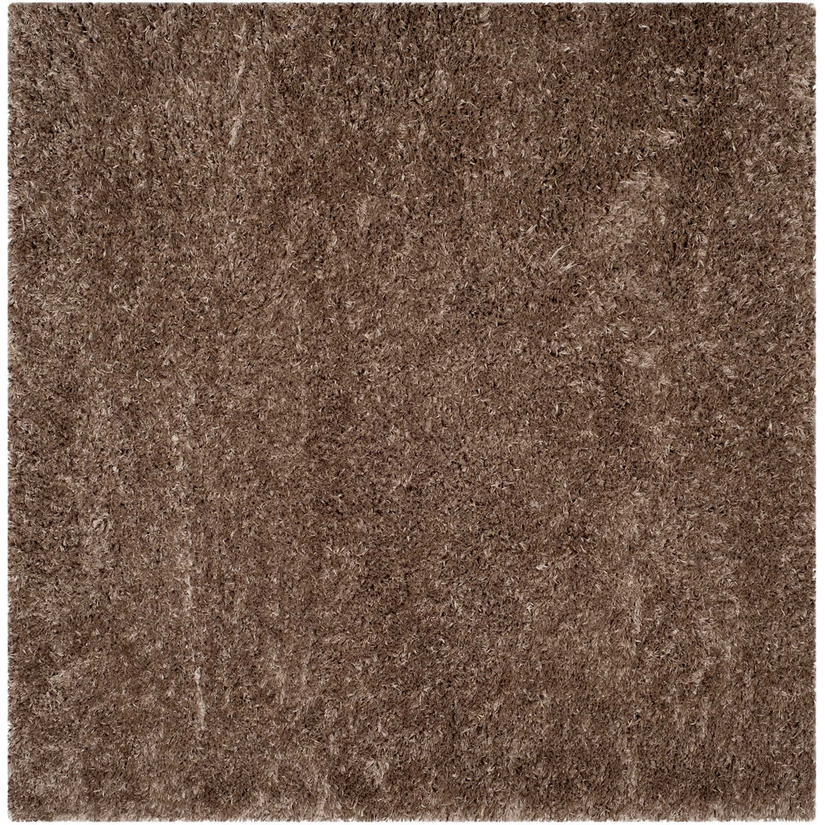 A square mushroom shag rug provides a deep neutral tone and invitingly soft texture.