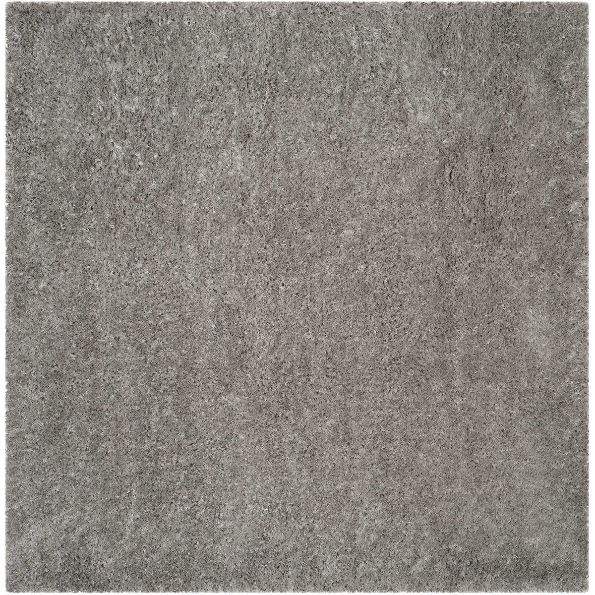 A square silver shag rug brings softly varied gray tones and a lush, fluffy pile.