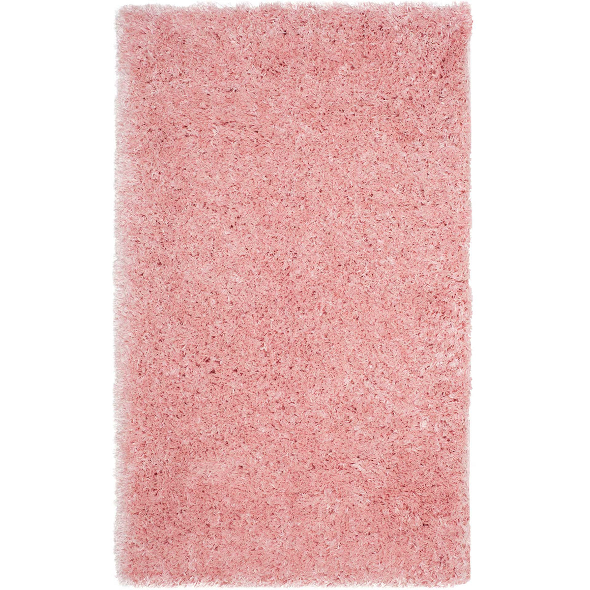 A compact light pink rug adds a cozy layer of dense, fluffy shag to small spaces.