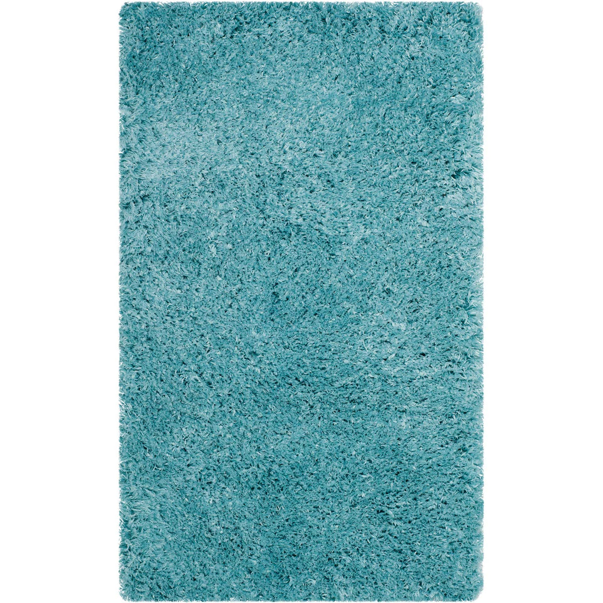 A compact turquoise shag rug brings vibrant color and fluffy comfort underfoot.