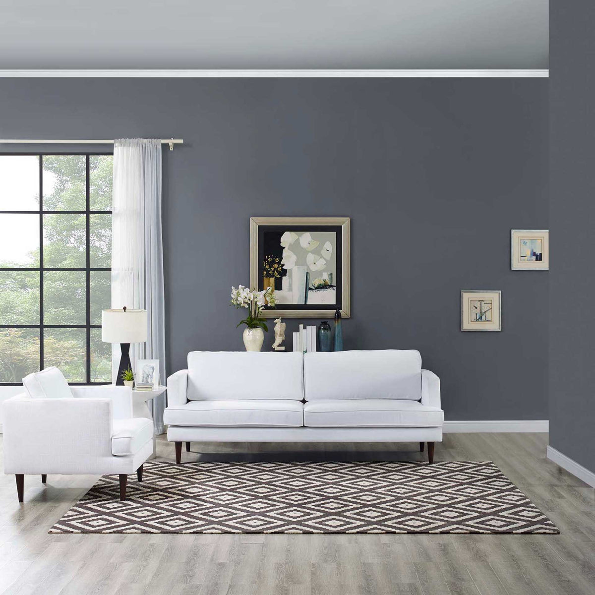 An expansive brown and ivory trellis rug anchors white seating in a modern living room.